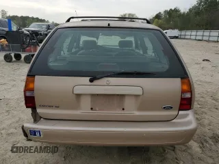 1999 Ford Escort SE with VIN 3FAFP15P0XR167167, listed as a Copart auction lot 52094765 with 154,960 mi miles and Salvage Title. Bid and sale history available at carsss.com. Image 6.