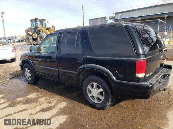 2000 Oldsmobile Bravada z VIN 1GHDT13W3Y2178106, wystawiony jako Copart lot #85069954 z przebiegiem 211 164 mil mil oraz Szkody całkowita. Historia ofert i sprzedaży dostępna na DreamBid. Obrazek 2.