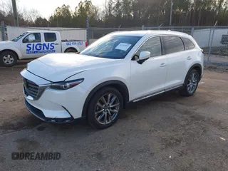 2016 Mazda CX-9 Grand Touring z VIN JM3TCADY4G0124588, wystawiony jako IAAI lot #41192549 z przebiegiem 161 272 mil mil oraz . Historia ofert i sprzedaży dostępna na DreamBid. Obrazek 18.