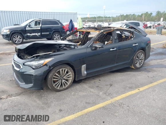 2018 Kia Stinger Premium with VIN KNAE25LA1J6011067, listed as a IAAI auction lot 40893308 with 20 mi miles. Bid and sale history available at carsss.com. Image 2.