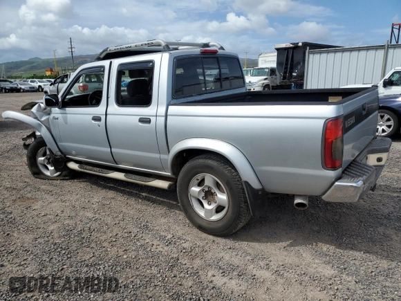 2000 Nissan Frontier XE with VIN 1N6ED27T8YC367452, listed as a Copart auction lot 55866345 with 242,945 mi miles and Salvage title. Bid and sale history available at DreamBid. Image 2.