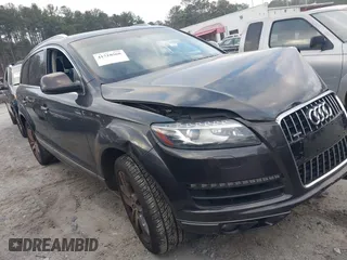2014 Audi Q7 3.0T Premium Plus with VIN WA1LGAFE1ED006143, listed as a IAAI auction lot 41510568 with 155,444 mi miles. Bid and sale history available at carsss.com. Image 1.
