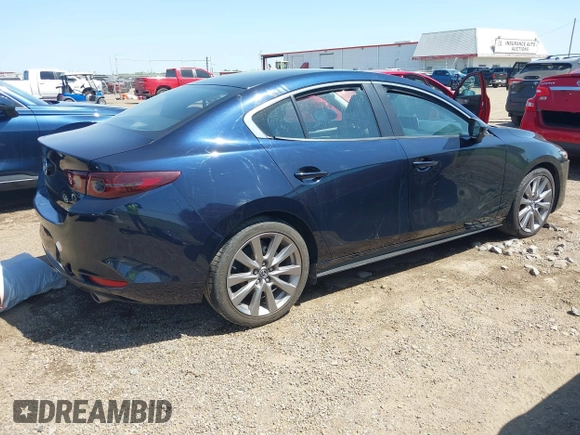 2021 Mazda 3 Select with VIN JM1BPABL7M1314973, listed as a IAAI auction lot 42011342 with 53,785 mi miles and . Bid and sale history available at DreamBid. Image 4.