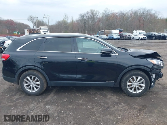 2017 Kia Sorento LX with VIN 5XYPGDA56HG209874, listed as a IAAI auction lot 42041004 with 151,205 mi miles and . Bid and sale history available at carsss.com. Image 13.