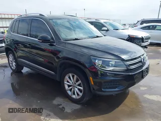2017 Volkswagen Tiguan Wolfsburg Edition with VIN WVGRV7AX2HK015267, listed as a IAAI auction lot 41588189 with 102,058 mi miles and . Bid and sale history available at DreamBid. Image 1.