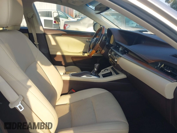 2016 Lexus ES 300h z VIN JTHBW1GG7G2115384, wystawiony jako IAAI lot #42103591 z przebiegiem 86 598 mil mil oraz . Historia ofert i sprzedaży dostępna na DreamBid. Obrazek 5.