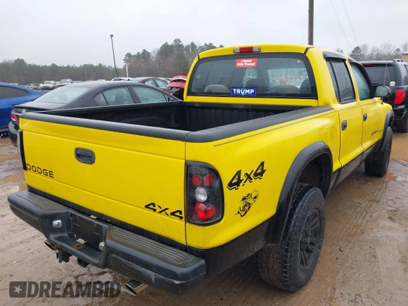 2004 Dodge Dakota Sport z VIN 1D7HG38N64S752270, wystawiony jako IAAI lot #41555599 z przebiegiem 121 283 mil mil oraz . Historia ofert i sprzedaży dostępna na DreamBid. Obrazek 4.