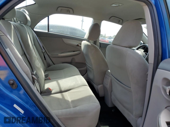 2010 Toyota Corolla z VIN 1NXBU4EE0AZ174665, wystawiony jako Copart lot #52187365 z przebiegiem 121 769 mil mil oraz Szkoda całkowita • Salvage title. Historia ofert i sprzedaży dostępna na DreamBid. Obrazek 10.