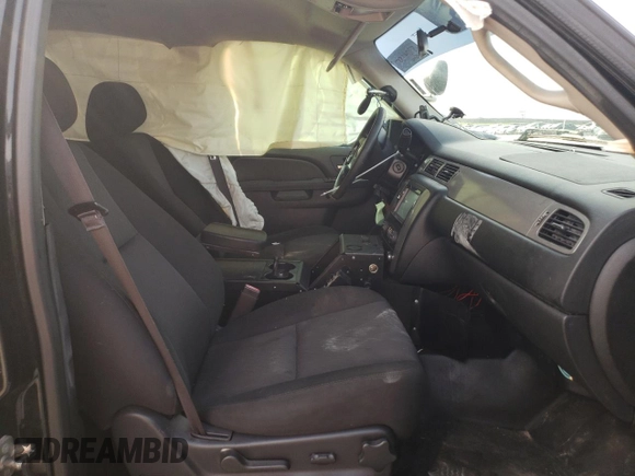 2013 Chevrolet Tahoe Commercial with VIN 1GNLC2E00DR304026, listed as a Copart auction lot 57041135 with 125,087 mi miles and Salvage title. Bid and sale history available at DreamBid. Image 7.
