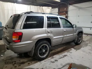 2001 Jeep Grand Cherokee Limited with VIN 1J4GW58N91C664611, listed as a Copart auction lot 53330755 with 212,479 mi miles and Salvage Title. Bid and sale history available at carsss.com. Image 3.