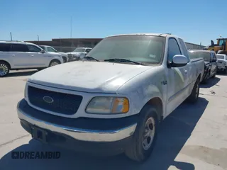 2002 Ford F-150 XL with VIN 1FTRX17232NA78925, listed as a IAAI auction lot 41851582 with 43 mi miles. Bid and sale history available at carsss.com. Image 2.