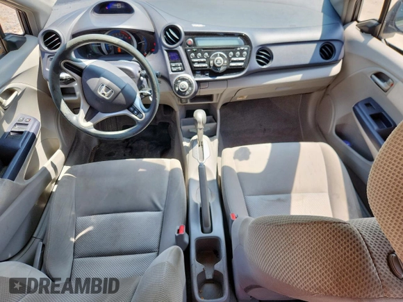 2010 Honda Insight LX with VIN JHMZE2H52AS043392, listed as a Copart auction lot 61347625 with 194,248 mi miles and Salvage title. Bid and sale history available at DreamBid. Image 8.