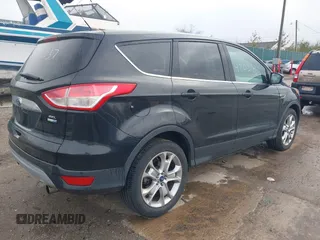 2013 Ford Escape SEL with VIN 1FMCU9H93DUC79592, listed as a IAAI auction lot 42039037 with 63,020 mi miles and . Bid and sale history available at DreamBid. Image 4.