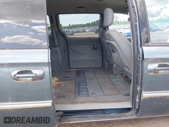 2006 Chrysler Town & Country Touring z VIN 2A4GP54L56R759683, wystawiony jako IAAI lot #42525277 z przebiegiem 107 319 mil mil oraz . Historia ofert i sprzedaży dostępna na DreamBid. Obrazek 8.
