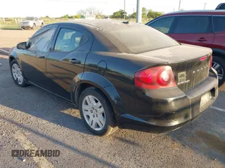 2014 Dodge Avenger SE with VIN 1C3CDZABXEN144000, listed as a IAAI auction lot 41878635 with 153,097 mi miles and . Bid and sale history available at DreamBid. Image 3.
