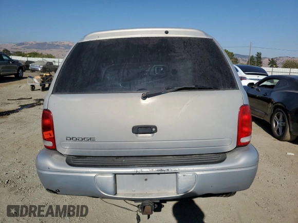 2000 Dodge Durango z VIN 1B4HR28Y4YF278422, wystawiony jako Copart lot #69119144 z przebiegiem 156 012 mil mil oraz Szkoda całkowita • Salvage title. Historia ofert i sprzedaży dostępna na DreamBid. Obrazek 6.