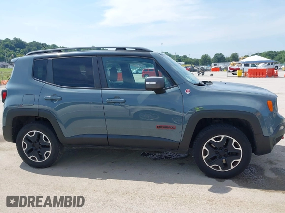 2015 Jeep Renegade Trailhawk with VIN ZACCJBCT8FPB33586, listed as a IAAI auction lot 42590207 with 127,168 mi miles and . Bid and sale history available at DreamBid. Image 13.