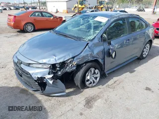 2023 Toyota Corolla LE with VIN JTDB4MEE7P3009635, listed as a IAAI auction lot 41808167 with 22,773 mi miles and . Bid and sale history available at DreamBid. Image 2.