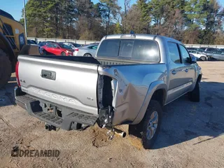 2018 Toyota Tacoma SR with VIN 5TFCZ5AN6JX130397, listed as a IAAI auction lot 39790739 with 115,445 mi miles. Bid and sale history available at carsss.com. Image 4.