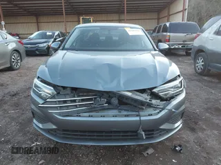 2021 Volkswagen Jetta S z VIN 3VWC57BU2MM023545, wystawiony jako IAAI lot #41285910 z przebiegiem 79 753 mil mil oraz . Historia ofert i sprzedaży dostępna na DreamBid. Obrazek 12.