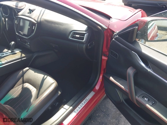 2015 Maserati Ghibli with VIN ZAM57XSA5F1129883, listed as a IAAI auction lot 41920750 with 63,739 mi miles. Bid and sale history available at carsss.com. Image 5.