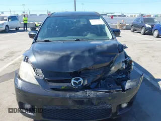 2006 Mazda 5 Sport with VIN JM1CR29L560126780, listed as a IAAI auction lot 41653391 with 112,547 mi miles and . Bid and sale history available at DreamBid. Image 12.