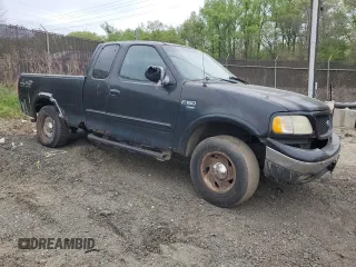 2000 Ford F-150 XL with VIN 1FTRX18W0YNC08668, listed as a Copart auction lot 53636035 with 0 mi miles and Salvage Title. Bid and sale history available at carsss.com. Image 4.