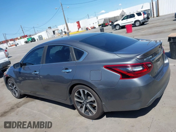 2018 Nissan Altima SR with VIN 1N4AL3AP6JC120402, listed as a IAAI auction lot 41949433 with 58,595 mi miles and . Bid and sale history available at carsss.com. Image 14.