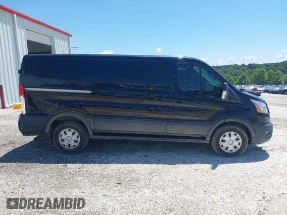 2020 Ford Transit Cargo z VIN 1FTYE1Y89LKB76753, wystawiony jako IAAI lot #42468252 z przebiegiem 53 193 mil mil oraz . Historia ofert i sprzedaży dostępna na DreamBid. Obrazek 13.