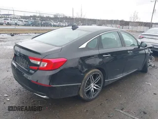 2022 Honda Accord Touring with VIN 1HGCV3F90NA007703, listed as a IAAI auction lot 41506563 with 35,714 mi miles and . Bid and sale history available at DreamBid. Image 4.
