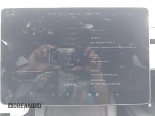 2023 Tesla Model Y Performance z VIN 7SAYGDEF1PF925274, wystawiony jako IAAI lot #42078813 z przebiegiem 20 422 mil mil oraz . Historia ofert i sprzedaży dostępna na DreamBid. Obrazek 7.
