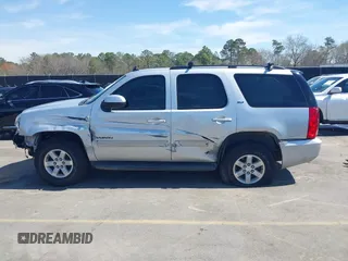 2014 GMC Yukon SLT with VIN 1GKS1CE04ER121301, listed as a IAAI auction lot 41825056 with 141,562 mi miles. Bid and sale history available at carsss.com. Image 15.
