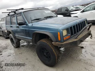 1999 Jeep Cherokee Sport with VIN 1J4FF68S4XL567848, listed as a Copart auction lot 43222045 with 280,178 mi miles and Salvage title. Bid and sale history available at DreamBid. Image 4.