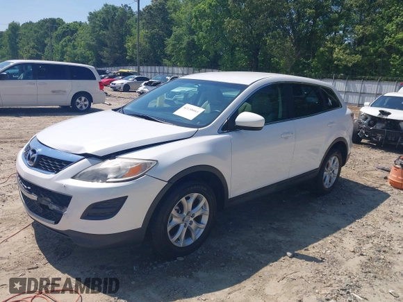2011 Mazda CX-9 Sport with VIN JM3TB2BA7B0304087, listed as a IAAI auction lot 42138663 with 186,964 mi miles and . Bid and sale history available at DreamBid. Image 2.