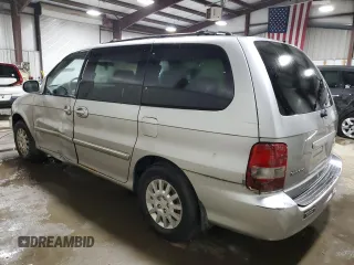 2003 Kia Sedona LX with VIN KNDUP131736467120, listed as a Copart auction lot 61992234 with 133,222 mi miles and Salvage Title. Bid and sale history available at carsss.com. Image 2.