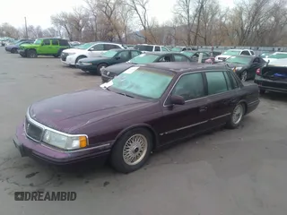 1994 Lincoln Continental with VIN 1LNLM9840RY602663, listed as a IAAI auction lot 31711429 with 90,889 mi miles and . Bid and sale history available at DreamBid. Image 2.