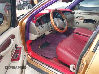 2003 Lincoln Town Car Cartier z VIN 1LNHM83WX3Y633077, wystawiony jako IAAI lot #42501273 z przebiegiem Nie podano mil oraz . Historia ofert i sprzedaży dostępna na DreamBid. Obrazek 12.