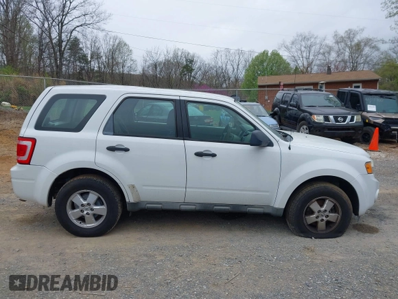 2009 Ford Escape XLS with VIN 1FMCU927X9KC79986, listed as a IAAI auction lot 41936917 with 208,816 mi miles and . Bid and sale history available at DreamBid. Image 14.