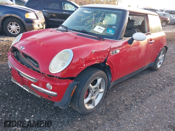 2004 MINI Hardtop with VIN WMWRC334X4TC50476, listed as a IAAI auction lot 41636967 with Not Provided miles and . Bid and sale history available at DreamBid. Image 2.