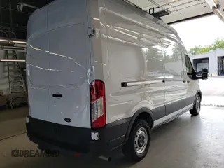 2023 Ford Transit Cargo with VIN 1FTBR1X86PKB99022, listed as a IAAI auction lot 42841650 with 14,234 mi miles and . Bid and sale history available at DreamBid. Image 16.