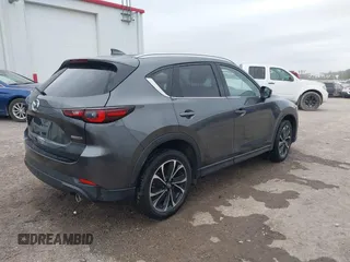 2023 Mazda CX-5 2.5 S Premium Plus Package with VIN JM3KFBEM2P0163054, listed as a IAAI auction lot 41642461 with 18,508 mi miles. Bid and sale history available at carsss.com. Image 4.