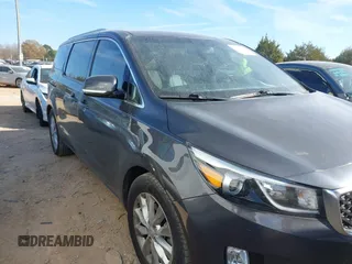 2016 Kia Sedona EX with VIN KNDMC5C10G6137795, listed as a IAAI auction lot 41015257 with 114,347 mi miles. Bid and sale history available at carsss.com. Image 1.