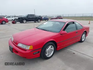 1990 Ford Thunderbird with VIN 1FAPP64R0LH184437, listed as a IAAI auction lot 41805675 with 88,399 mi miles and . Bid and sale history available at DreamBid. Image 6.