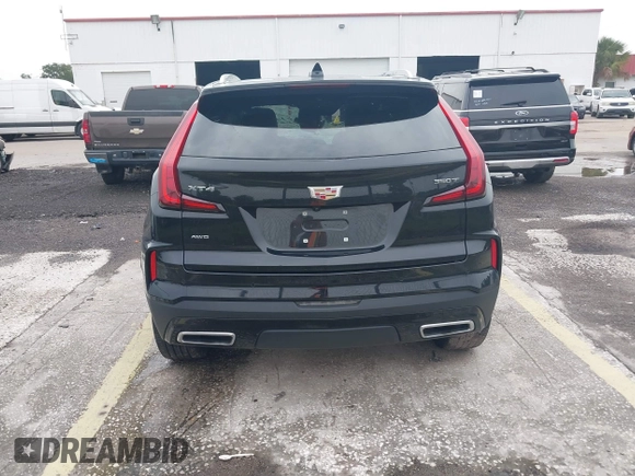 2024 Cadillac XT4 AWD Premium Luxury с VIN 1GYFZDR44RF147956, выставлен на аукционе IAAI как лот 42434595 с пробегом 26 328 миль миль и . История ставок и продаж доступна на DreamBid. Изображение 16.
