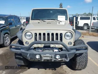 2017 Jeep Wrangler Unlimited Sahara with VIN 1C4BJWEG1HL746854, listed as a IAAI auction lot 41948127 with 97,730 mi miles. Bid and sale history available at carsss.com. Image 12.