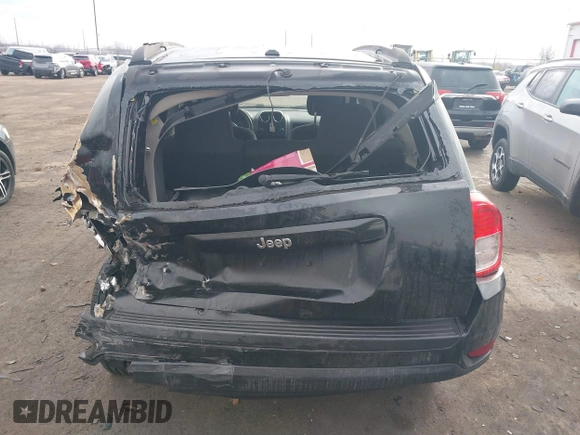 2012 Jeep Compass Sport with VIN 1C4NJCBA6CD660843, listed as a IAAI auction lot 41679095 with 173,950 mi miles. Bid and sale history available at carsss.com. Image 16.