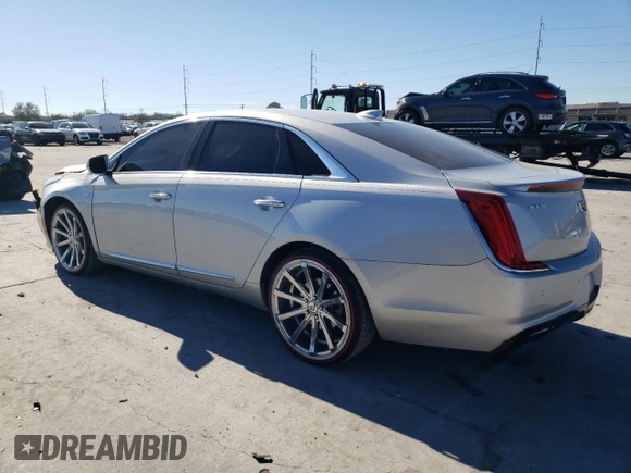 2018 Cadillac XTS with VIN 2G61L5S34J9134469, listed as a Copart auction lot 46660945 with 122,011 mi miles and Salvage Title. Bid and sale history available at carsss.com. Image 2.