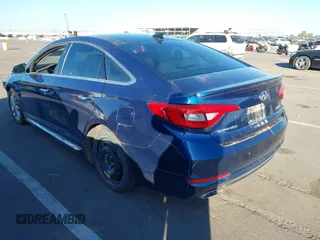2015 Hyundai Sonata 2.4L Sport with VIN 5NPE34AF5FH011725, listed as a IAAI auction lot 40838027 with 122,472 mi miles. Bid and sale history available at carsss.com. Image 3.