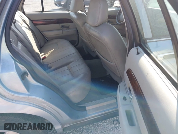 2005 Mercury Grand Marquis LS Premium z VIN 2MEFM75W15X621971, wystawiony jako IAAI lot #42130811 z przebiegiem 129 700 mil mil oraz . Historia ofert i sprzedaży dostępna na DreamBid. Obrazek 8.