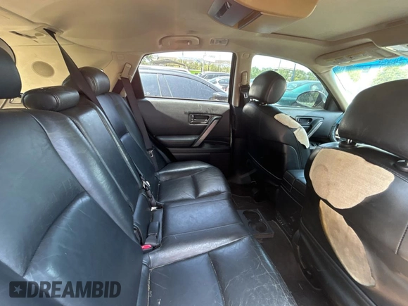 2003 Infiniti FX Options z VIN JNRAS08W93X205643, wystawiony jako Copart lot #58410885 z przebiegiem 210 110 mil mil oraz Tytuł czysty. Historia ofert i sprzedaży dostępna na DreamBid. Obrazek 6.